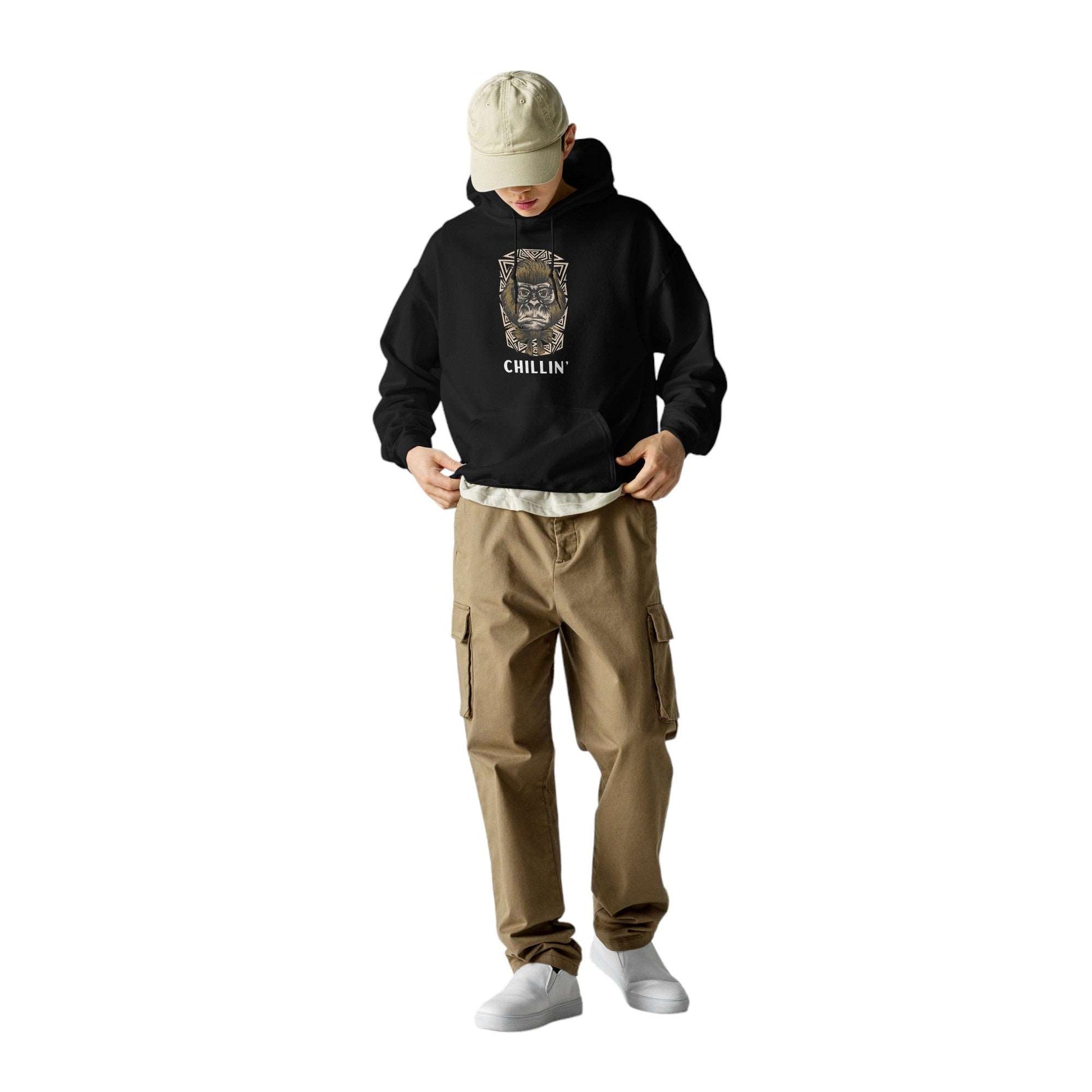 person wearing khaki pants and black hoodie with gorilla graphic and chillin' text | Ocean Rafts