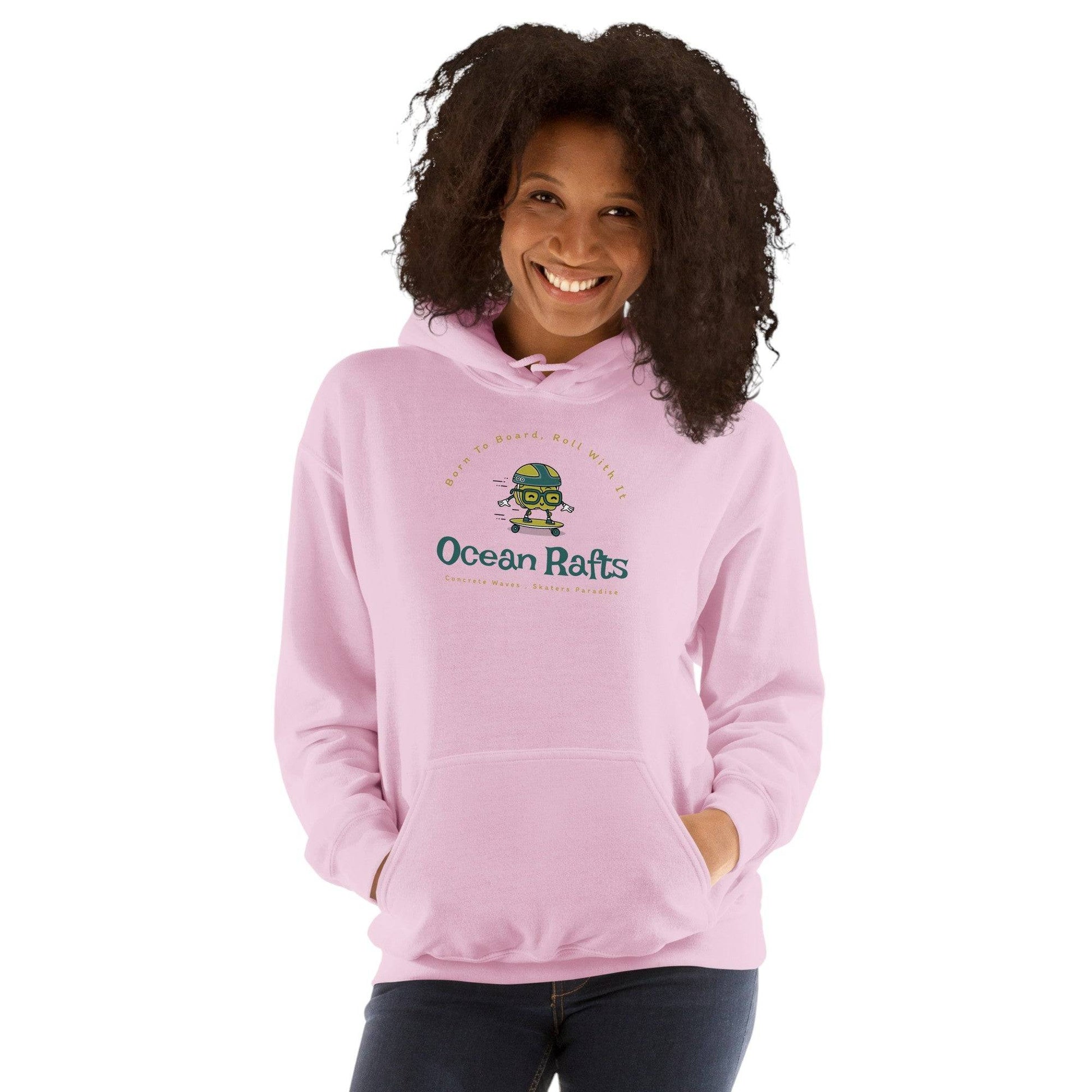 woman wearing a pink hoodie with concrete waves graphic and black jeans | Ocean Rafts