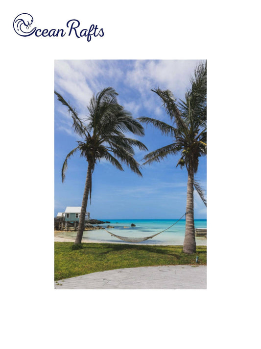 Hammock By The Sea Poster - Image of two palm trees on a tropical beach foreshore with a hammock tied between the palm trees. Light and colourful poster canvas. Free delivery home decor beach style new cheap | Ocean Rafts