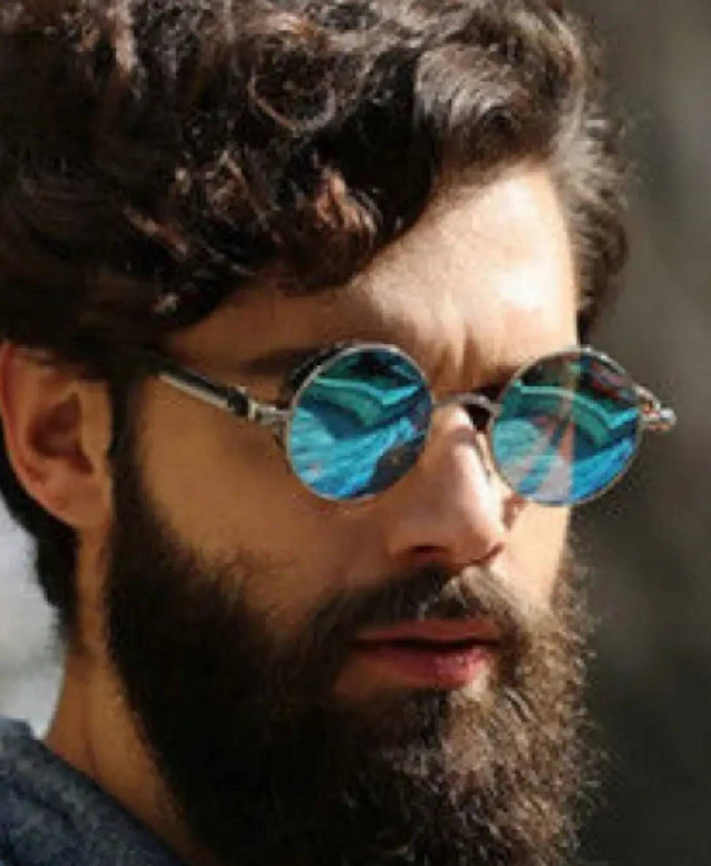 a man with a beard wearing round sunglasses free delivery included $20 cheap for men and women dropshipping stylish metal steam punk round sunnies | Ocean Rafts