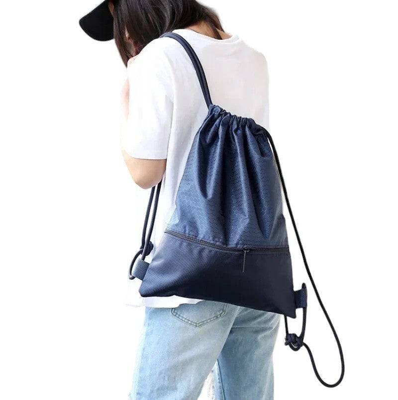 Woman wearing Outdoor Nylon Drawstring bag looking away Cheap Affordable $20 Free Delivery backpack | Ocean Rafts