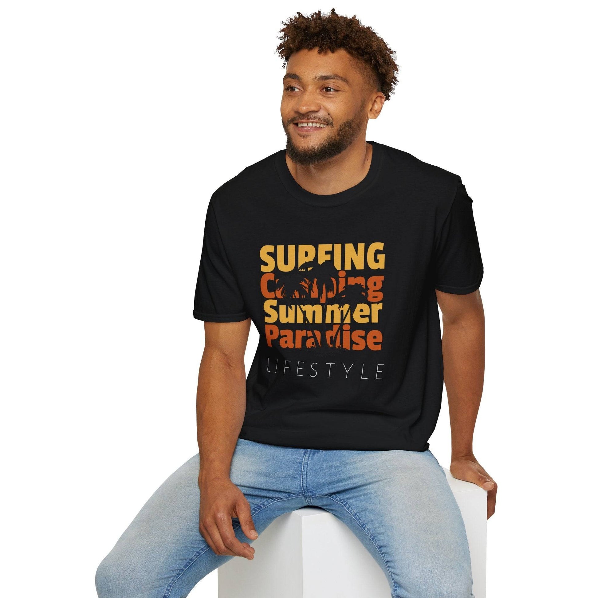 man wearing black Surfing camping and summer paradise text and graphic t shirt with a palm tree throughout the text - Orange and yellow text - Leightweight casual wear surf and skate beach new free delivery cheap $40 cotton and polyester | Ocean Rafts