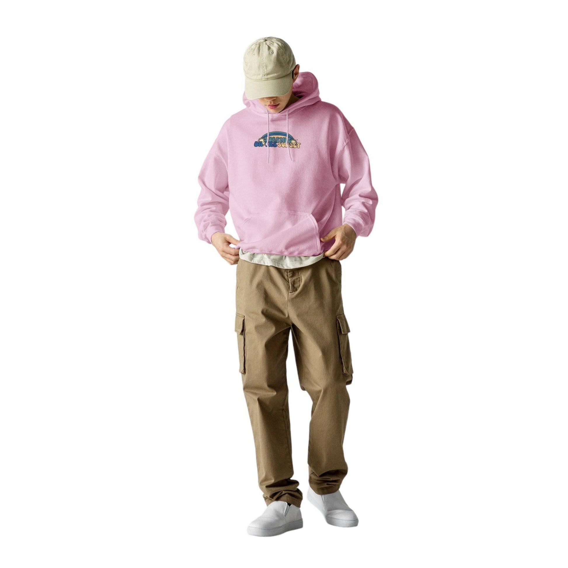 man wearing pink hoodie with surfing on the sunset graphic | Ocean Rafts