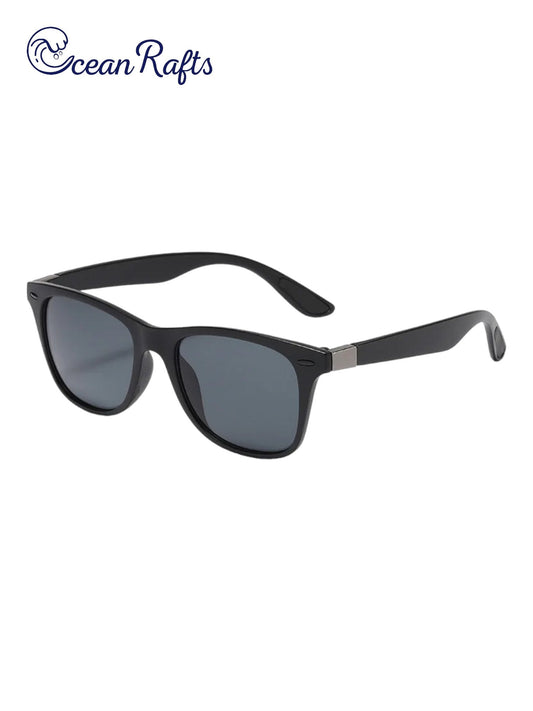 a pair of sunglasses with a black frame and grey lens Wayfarer Sunnies | Ocean Rafts